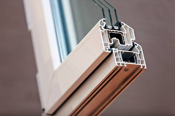 Cut of the window profile with metal, glass and insulation